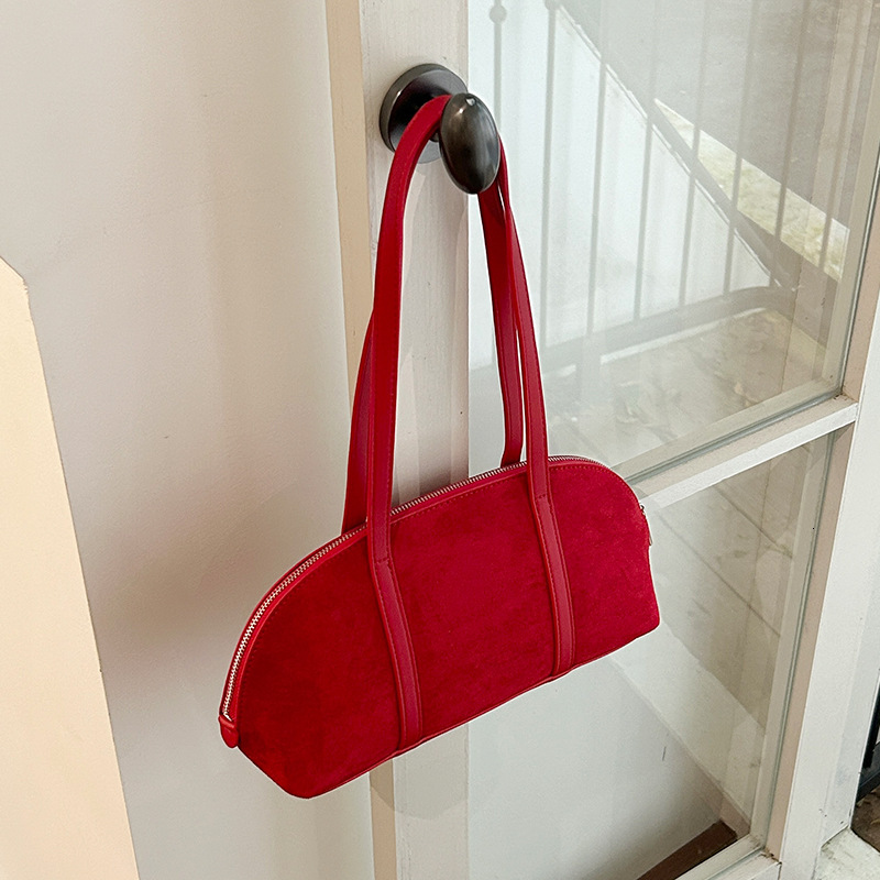 Designer's autumn and winter new hair stick bag, women's multifunctional shoulder bag, high-end large capacity commuting armpit bag