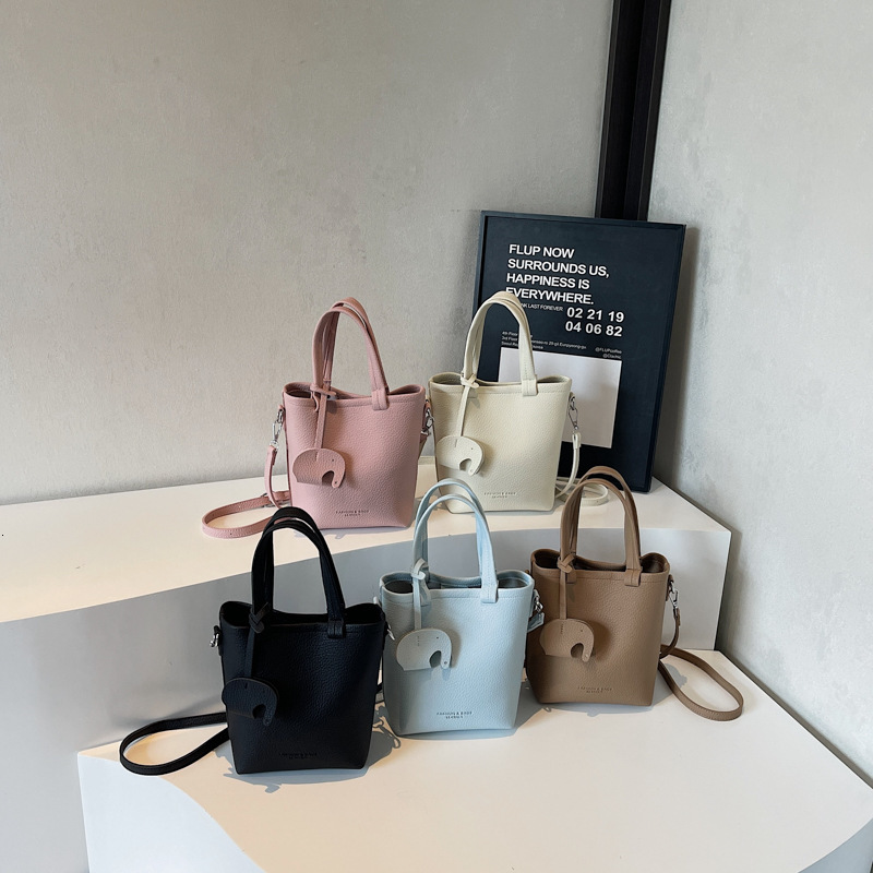 Free shipping designer bag Niche Casual Basket Bag for Women New Solid Color Bucket Bag Simple Handbag Single Shoulder Crossbody Bag