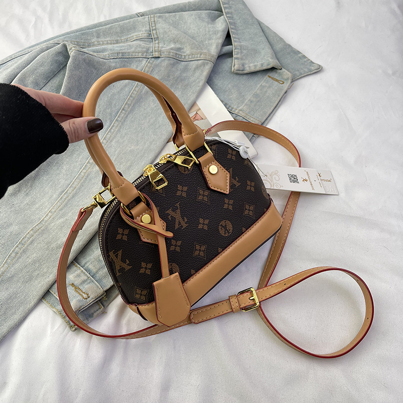 new Free Shipping Designer Bags Totes Fashion handbag women commuting printed casual bag