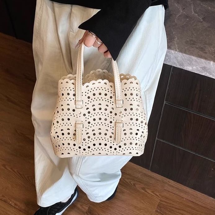 Chic Unisex Leather Clutch With Adjustable Straps & Unique Wave Embossing