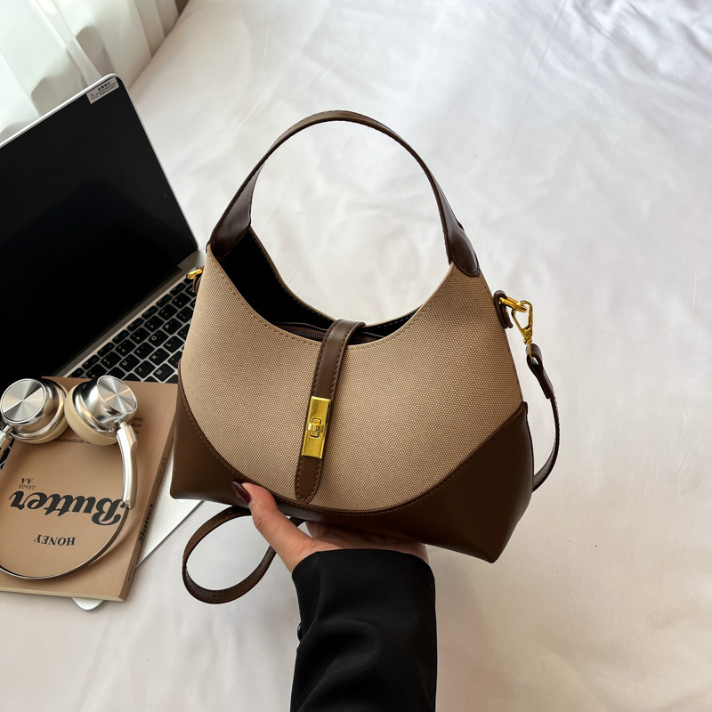 Free shipping designer bag High-end Color-blocking Niche Design Crossbody Bag for Women New Dumpling Bag Versatile Commuter Handbag Underarm Bag