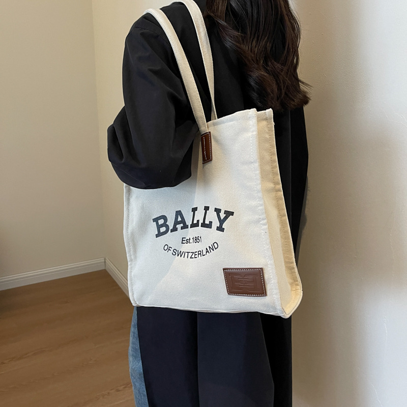 Free shipping designer bag Canvas Bag for Women New Trendy Large Capacity Tote Bag Simple Versatile Commuting Handbag Shoulder Bag