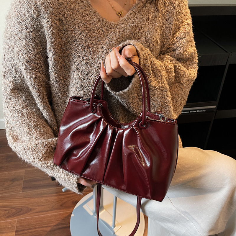Free shipping designer bag French Cloud Bag Handbag for Women New Autumn and Winter Casual Niche Pleated Shoulder Crossbody Bag