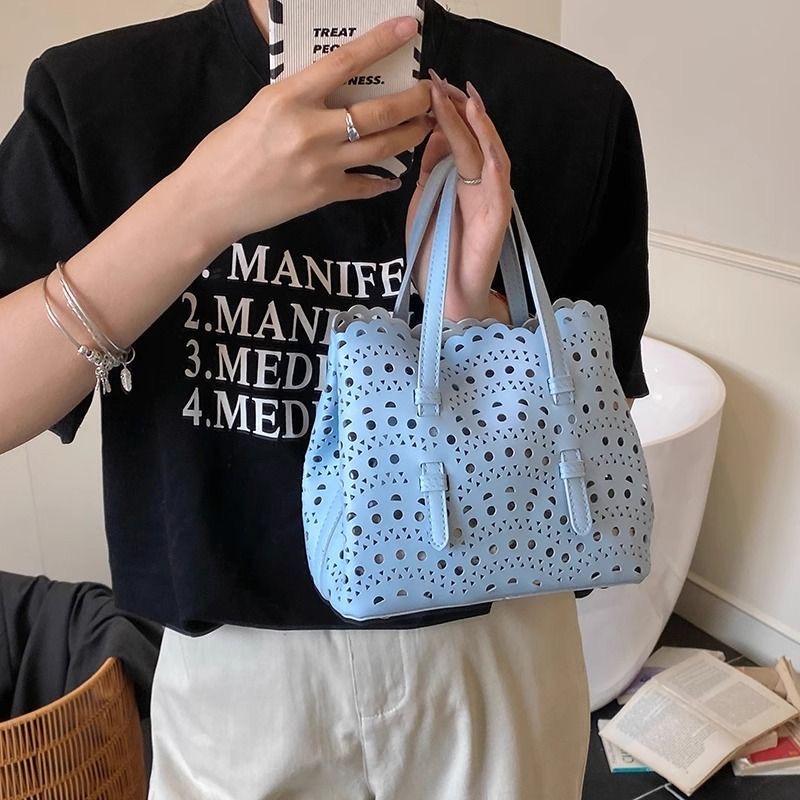 Chic Unisex Leather Clutch With Adjustable Straps & Unique Wave Embossing