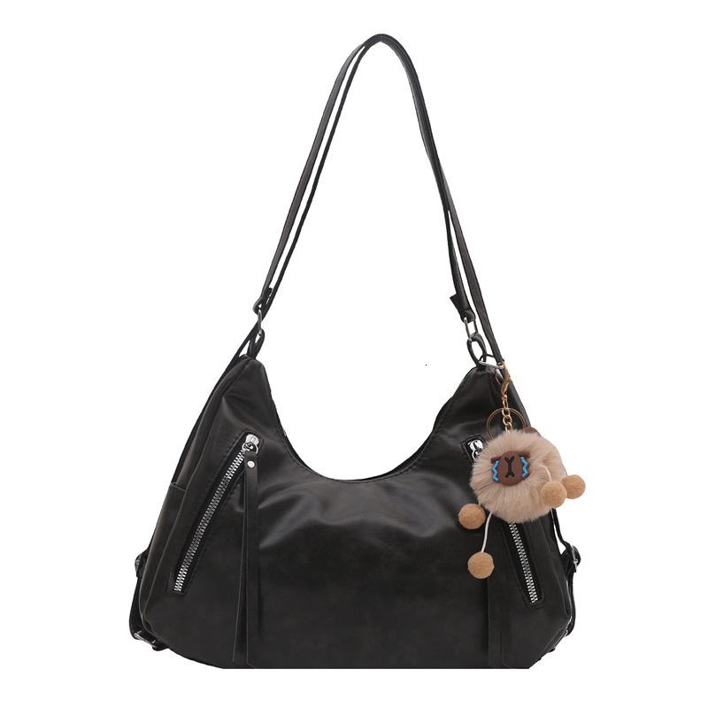 Winter new retro fashion women's handbag with simple Korean style niche design, luxurious texture, armpit bag, elegant designer bag