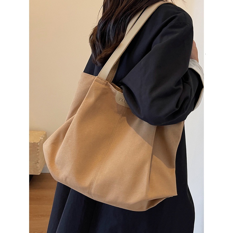 Designer ladies' large capacity canvas bag, fashionable new style, casual single shoulder tote bag, student class commuting tote bag