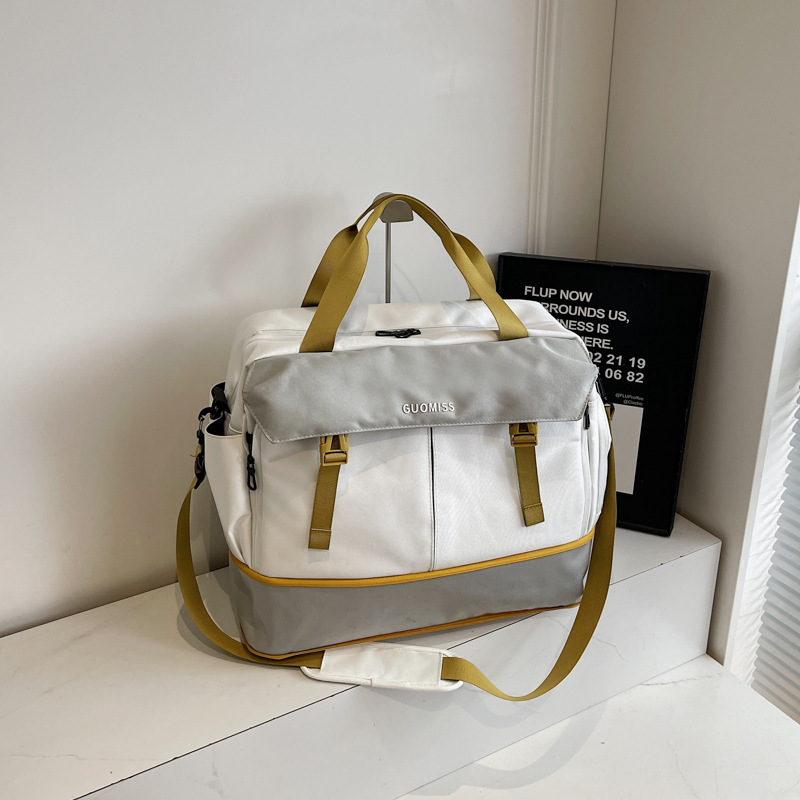 Travel Bag Large Capacity Women Can Pull Bar Box Boarding Bag Luggage Dry And Wet Separation Sports Fitness Bag Cross-Body Bag 2025s hot