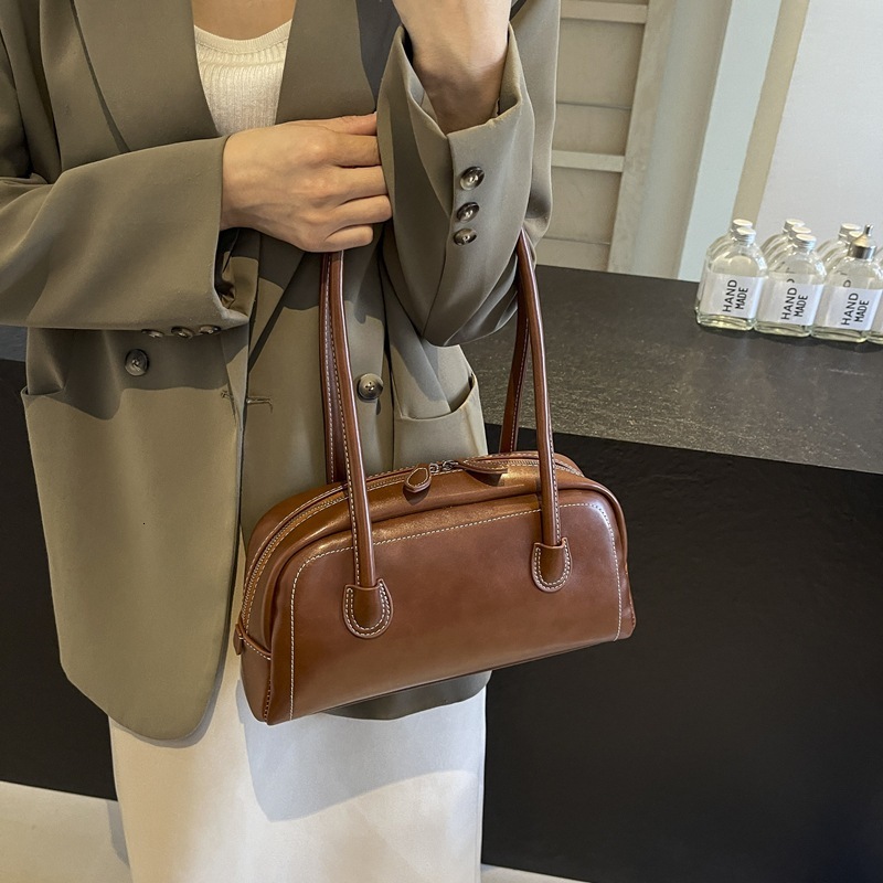 Free shipping designer bag Women New Fashion High-Quality Texture Underarm Handbag Trendy Versatile Shoulder Bag