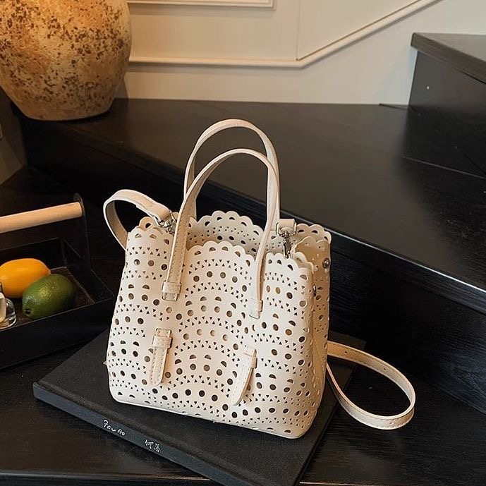 Chic Unisex Leather Clutch With Adjustable Straps & Unique Wave Embossing