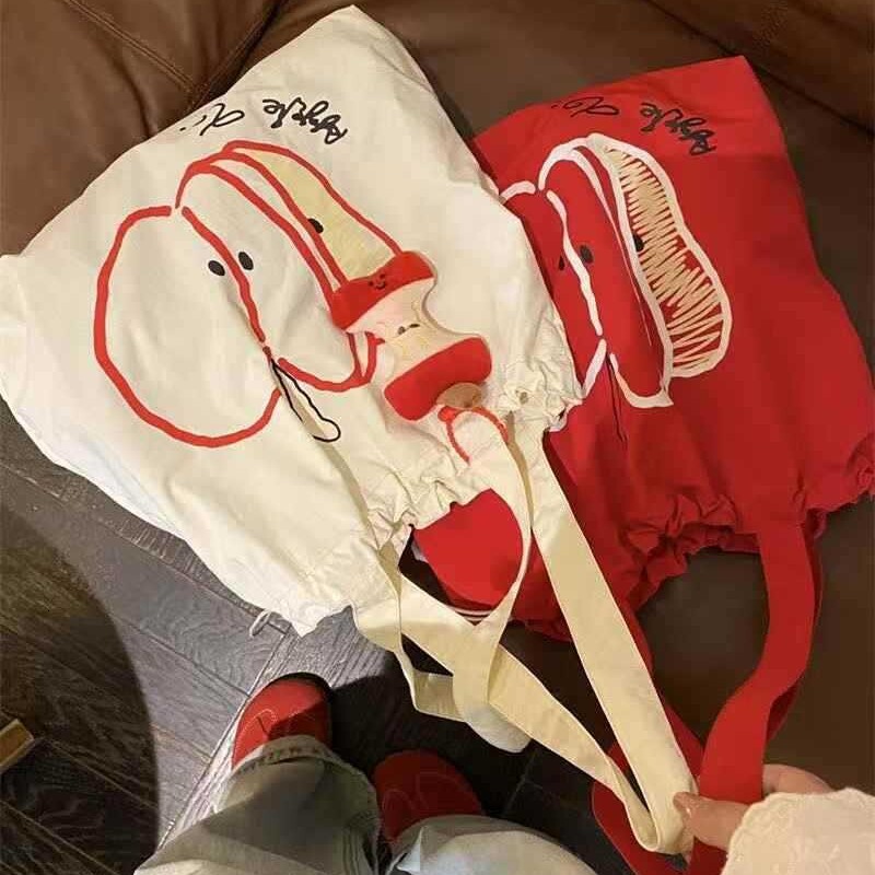 Designer's new Christmas drawstring canvas bag, fashionable commuting multifunctional shoulder bag, niche large capacity handbag