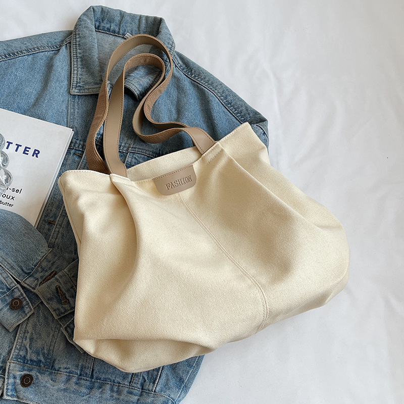 Designer ladies' large capacity canvas bag, fashionable new style, casual single shoulder tote bag, student class commuting tote bag