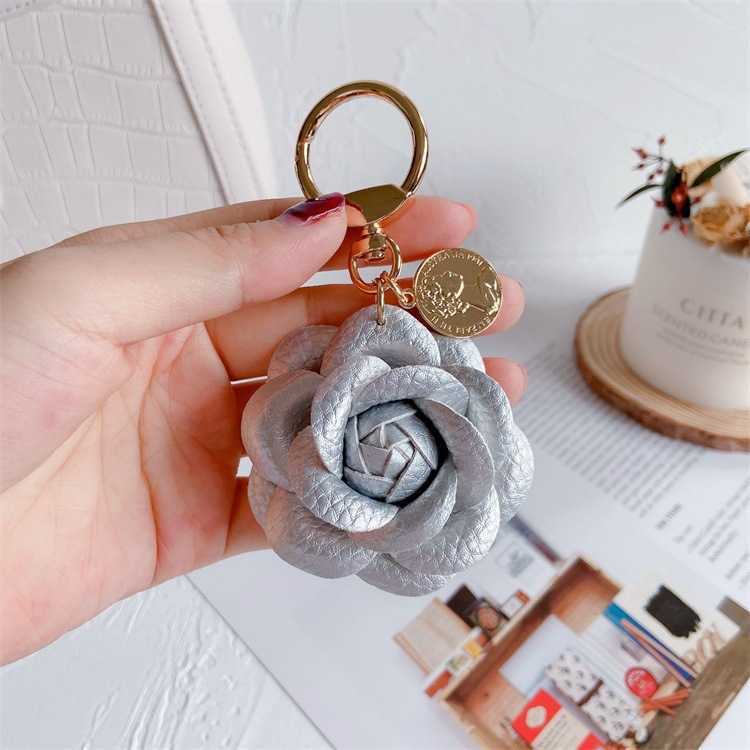 Fashion Leather Camellia Car Keychain Cute Flower Backpack Pendant Accessory Best Friend Key Ring for Women carefully crafted to suit a variety of sce