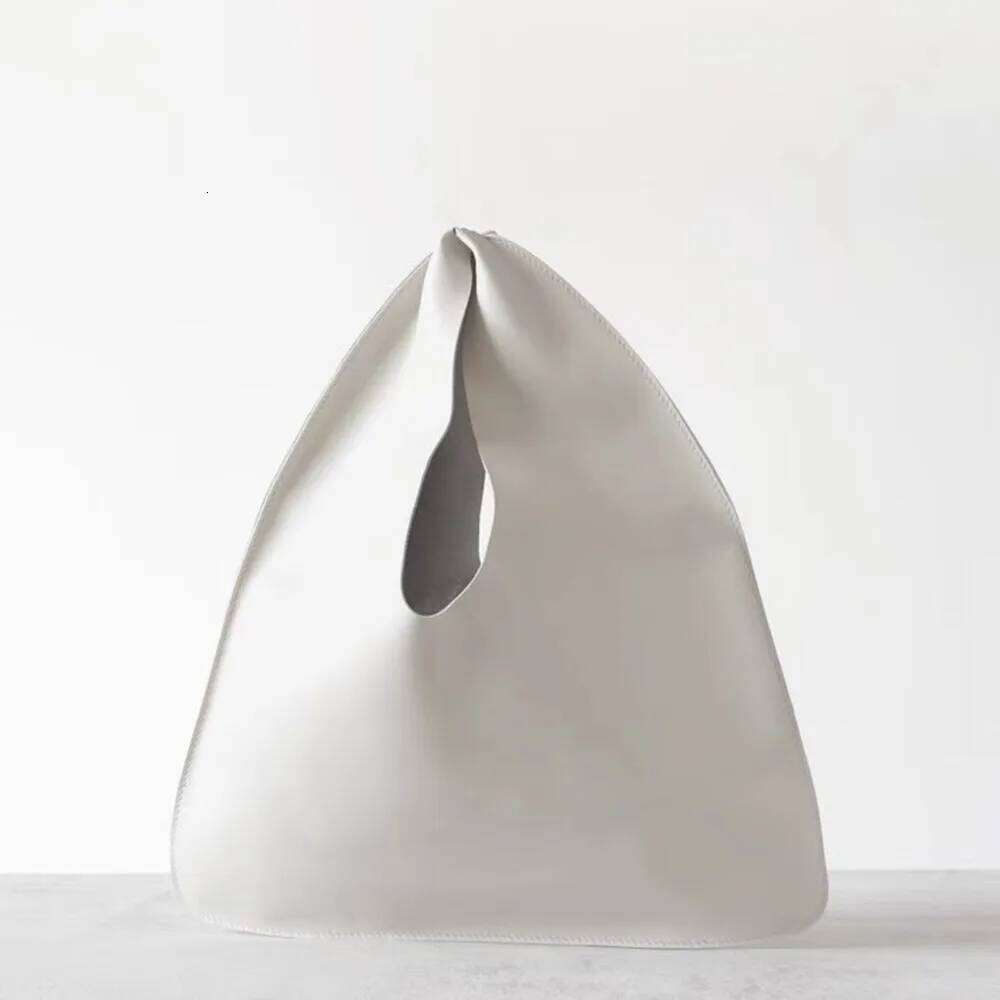 Designer Bags Minimalist Casual Lazy Niche Design Premium First Layer Sheepskin Triangle Hand Carry Handbag Women's Shoulder Underarm Bag Hot Sel