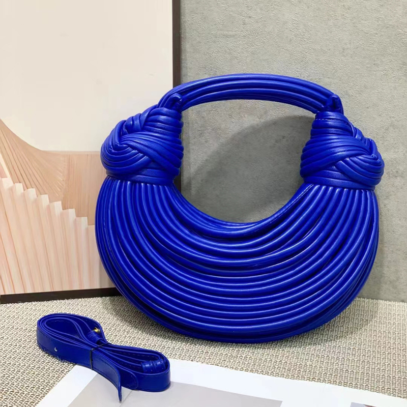 Luxury bag designer bag Handcrafted Designer Wristlet Bag: Elegant Handwoven Knots Detachable Noodle Strap Opulent Aesthetic Refined Minimalism