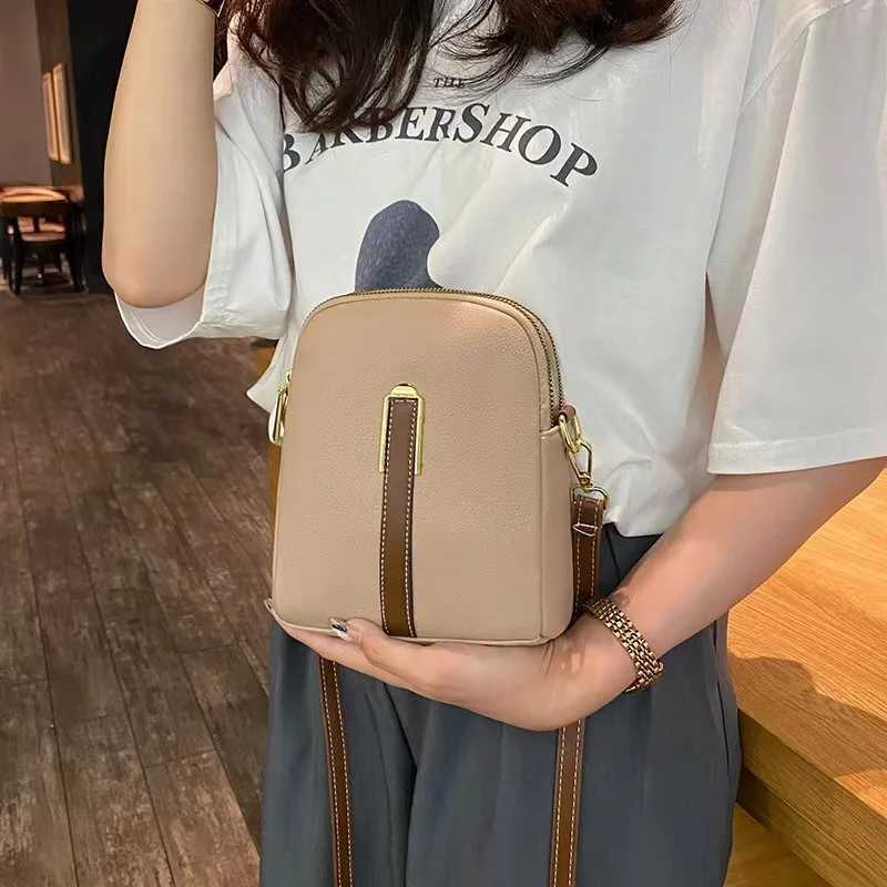 Crossbody bag womens new autumn and winter Japan and South Korea PU soft vertical solid color personality design with headphoneW251028