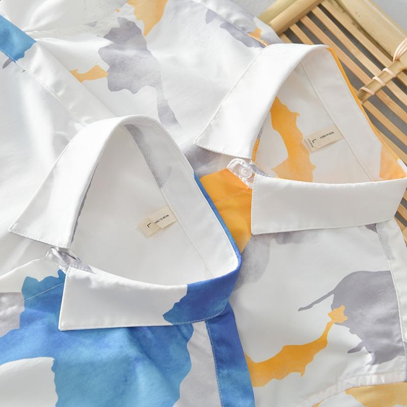 Spring and Autumn style lapel fashionable long sleeved mens printed button patch work shirt Korean style pure cotton top240802