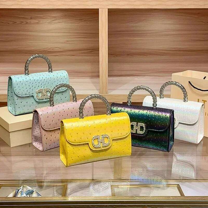 New underarm handbag ostrich pattern for ladies, lightweight luxury shoulder bag embedded with diamonds, elegant one-shoulder design.