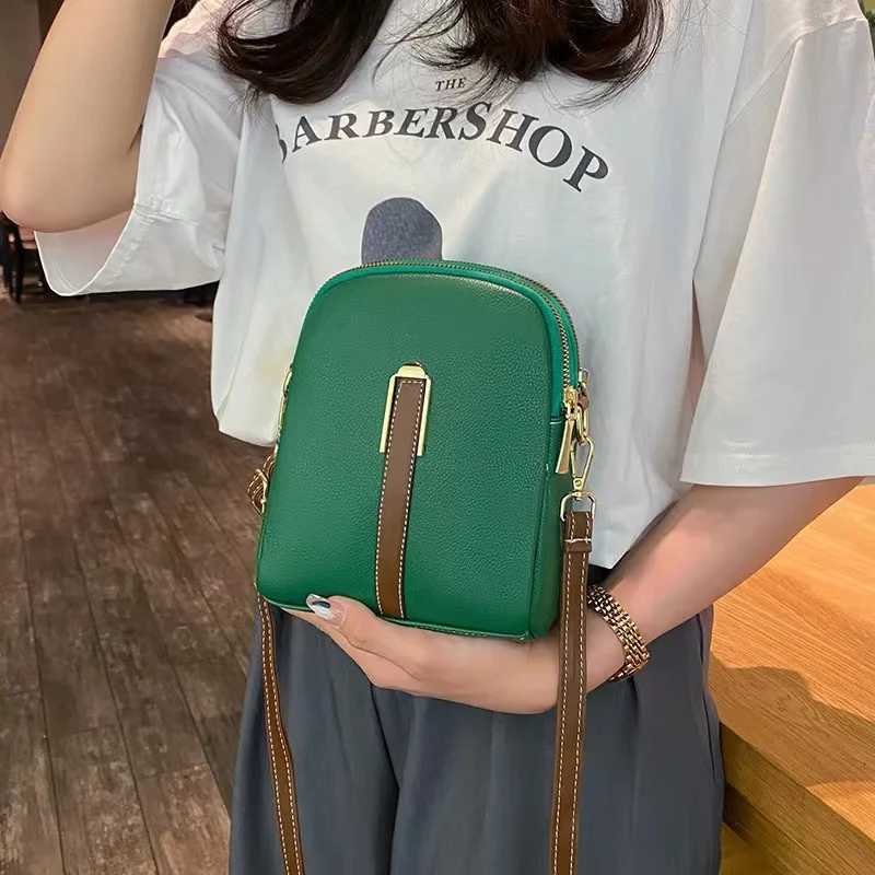 Crossbody bag womens new autumn and winter Japan and South Korea PU soft vertical solid color personality design with headphoneW251028