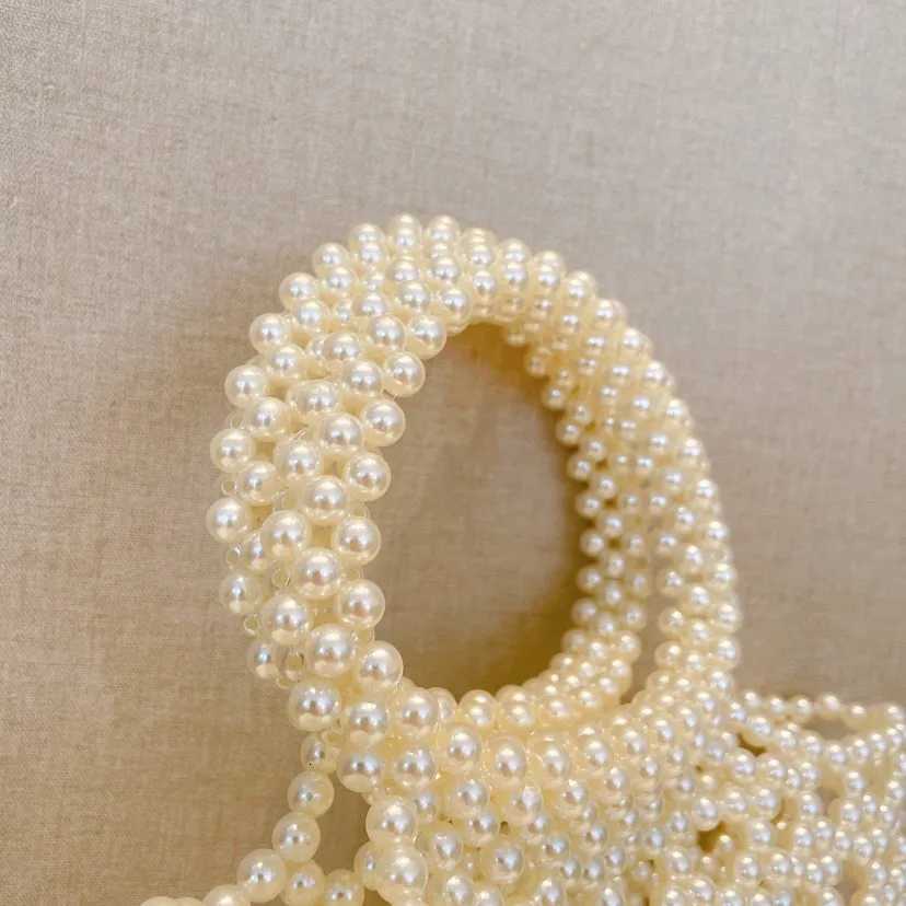 Fashion New Hollow Handmade Beaded Bag with Handheld pearl Bag for Wedding Party High quality Glittering Evening Bags Clutch bag H251027