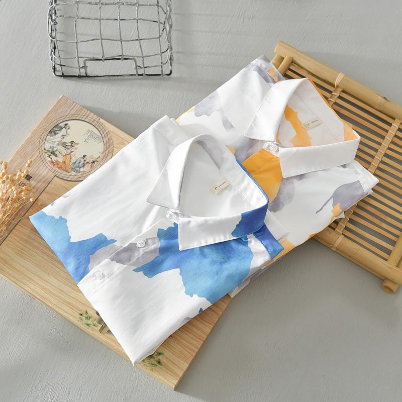 Spring and Autumn style lapel fashionable long sleeved mens printed button patch work shirt Korean style pure cotton top240802