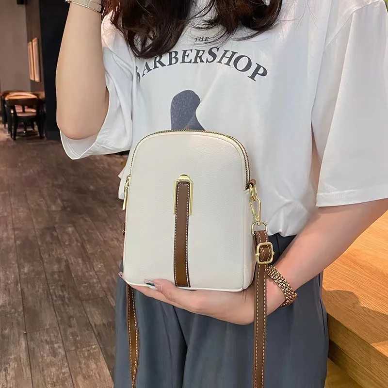 Crossbody bag womens new autumn and winter Japan and South Korea PU soft vertical solid color personality design with headphoneW251028