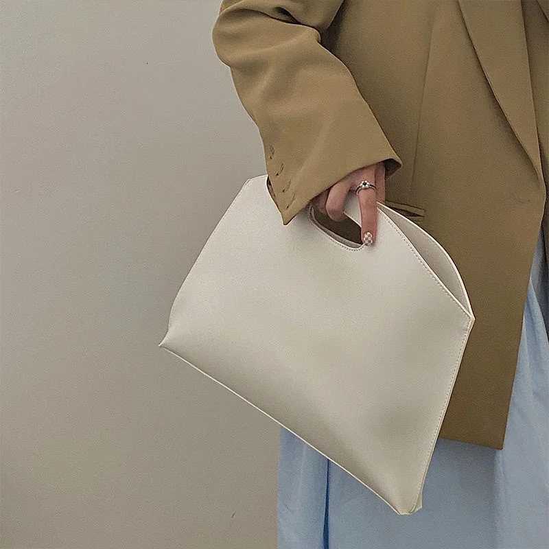 Womens Handbag New Largecapacity File Bag Fashionable Versatile Commuter Bag Leather Briefcase Envelope Clutch BagW251028