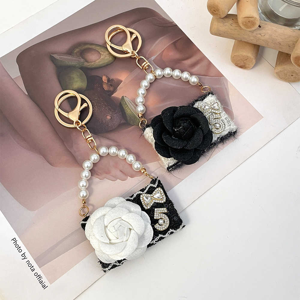 New fashionable camellia handbag model keychain autumnwinter bag decoration keychain small gift J251118