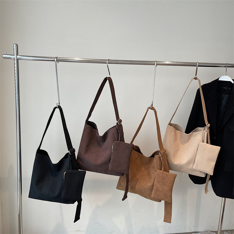 2025 Spring Women's New Simple and Fashionable Large Capacity Synthetic Leather Handbag Fashion College Student Daily Commuter Lightweight Crossb