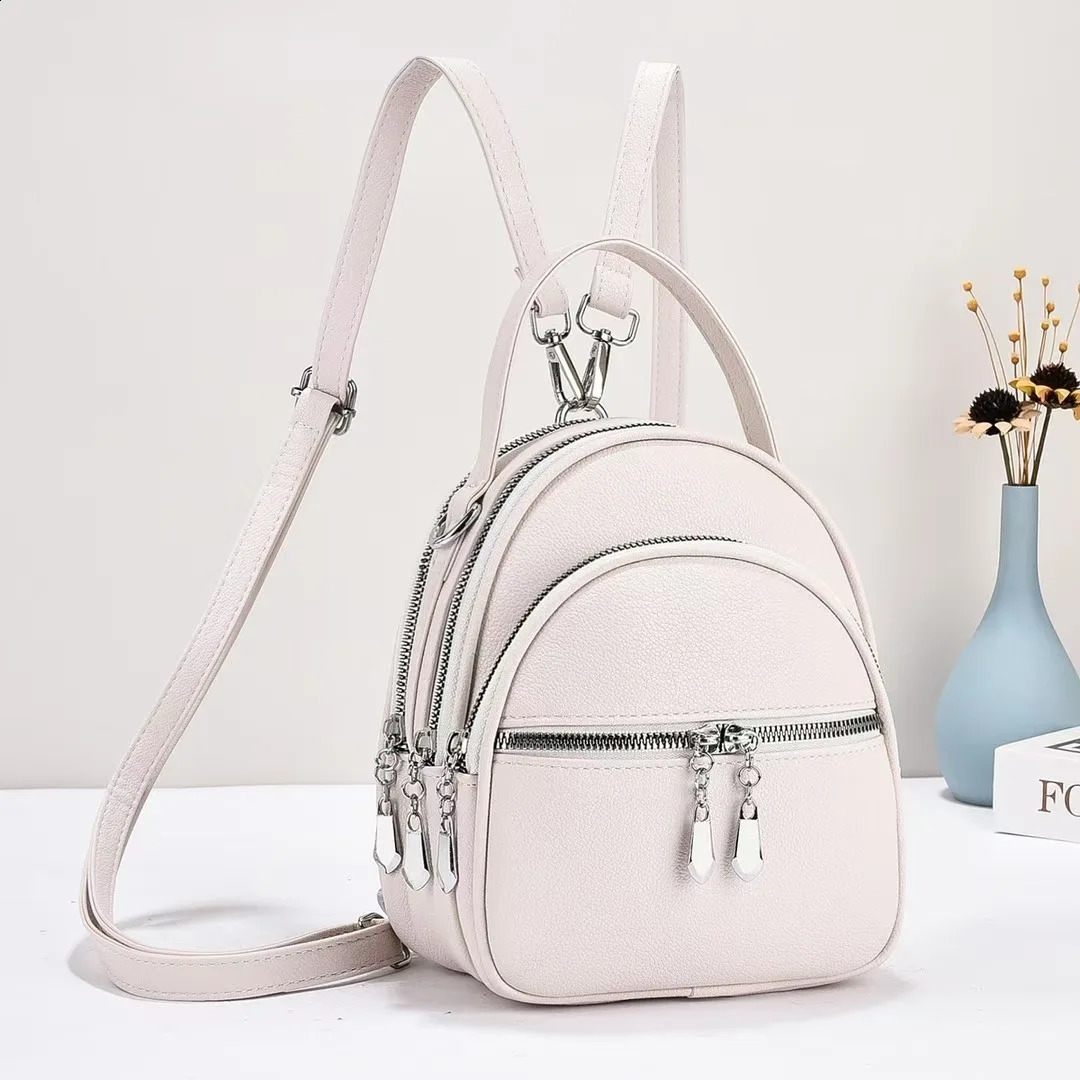 A highquality multifunctional small backpack for ladies a new mini handbag in solid color with a casual school style 251028