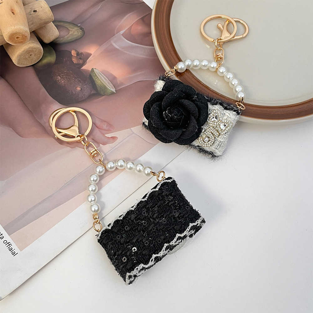 New fashionable camellia handbag model keychain autumnwinter bag decoration keychain small gift J251118