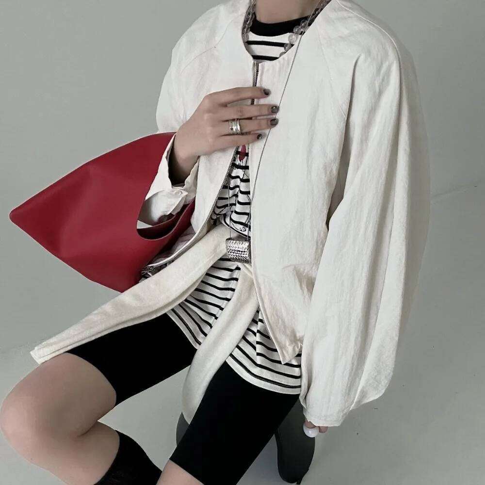 Designer Bags Minimalist Casual Lazy Niche Design Premium First Layer Sheepskin Triangle Hand Carry Handbag Women's Shoulder Underarm Bag Hot Sel