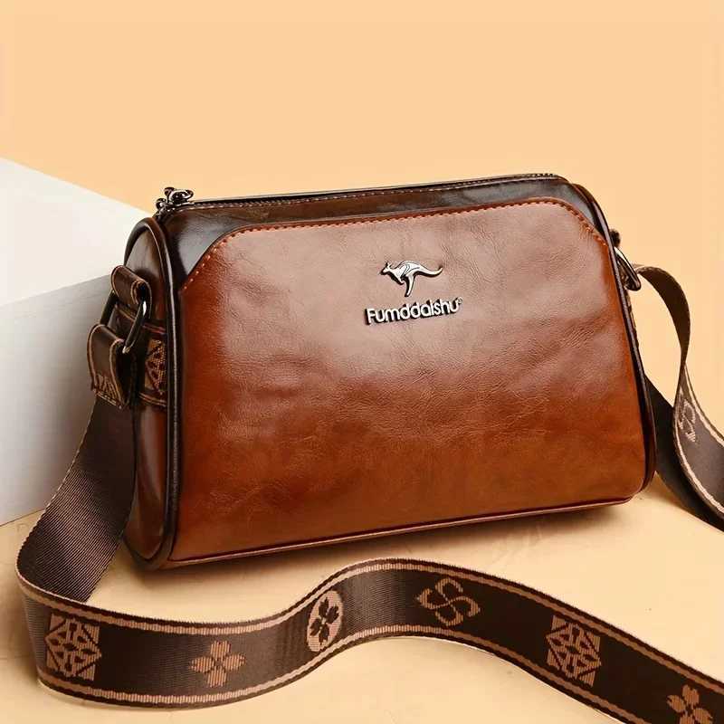 Retro Double Sided Leather Womens Crossbody Bag WaterResistant Pillow Shaped Shoulder Bag with Adjustable Strap Zipper ClosureW251028