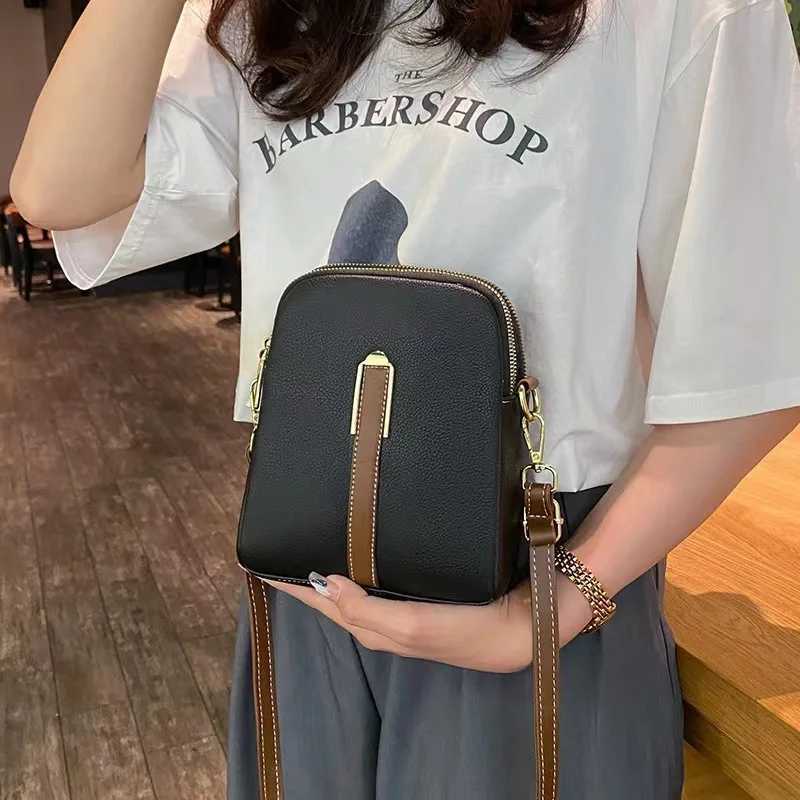 Crossbody bag womens new autumn and winter Japan and South Korea PU soft vertical solid color personality design with headphoneW251028