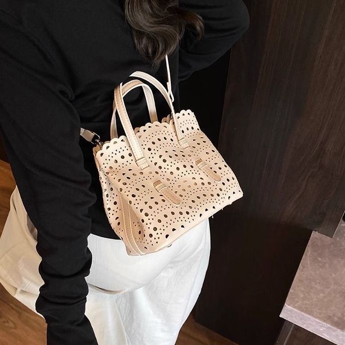 Chic Unisex Leather Clutch With Adjustable Straps & Unique Wave Embossing