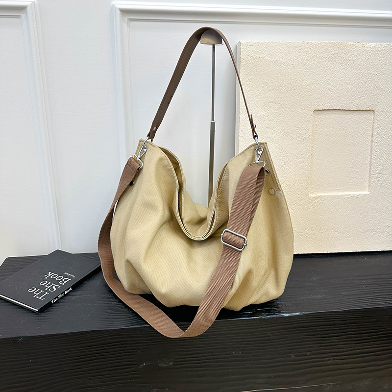 Autumn women's simple and fashionable large capacity synthetic leather handbag, new fashionable college student daily commuting lightweight shoul