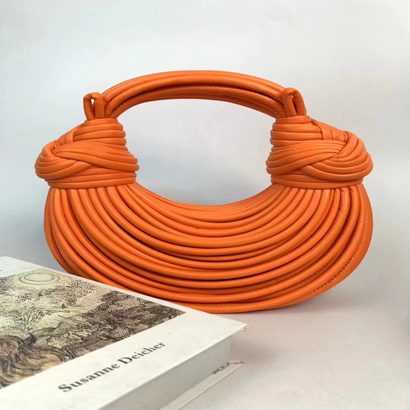 Luxury designer bag Handcrafted Designer Wristlet Bag: Luxurious Handwoven Knots Adjustable Noodle-Strap for Elegance Timeless Sophistication