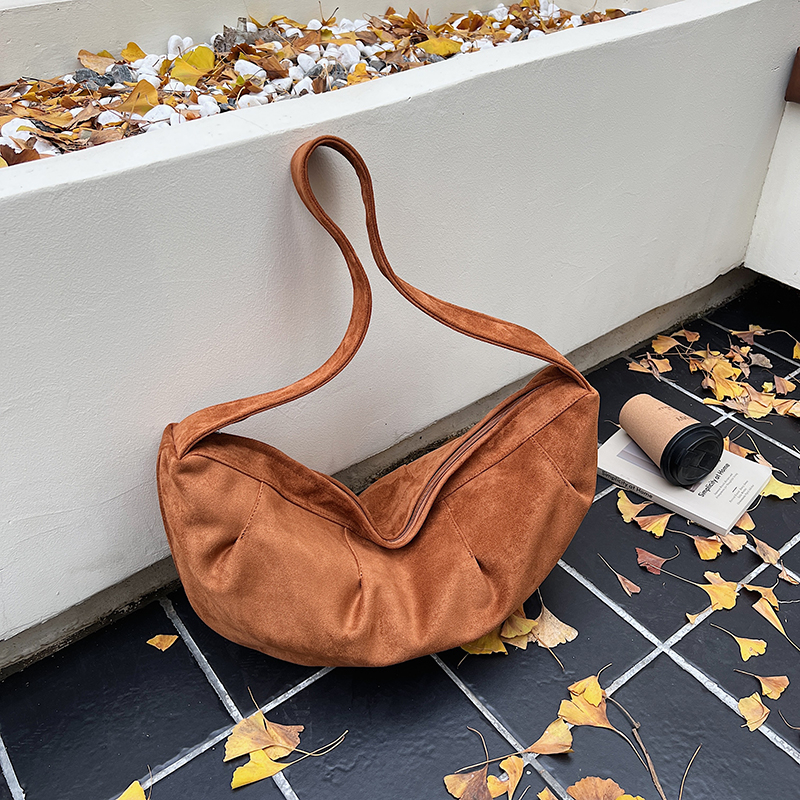 Spring women's simple and fashionable large capacity synthetic leather handbag, new fashionable college student daily commuting lightweight cross