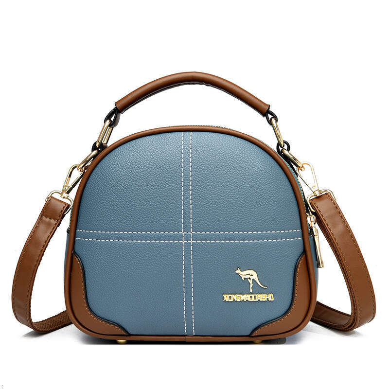 2025 New High-End Embroidered Crossbody Shoulder Women's Versatile Commuter Soft Leather Handbag Small Round Bag handbag for womens fashion bag