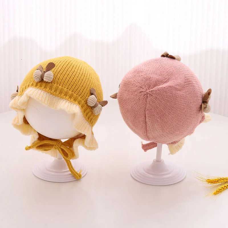 Korean Ruffle Baby Knitted Hat Winter Warm Toddler Ear Protection Cap Cute Solid Color Bow Kids Lacing Hats Bonnet251028