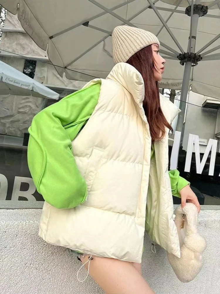 in Autumn Winter Women Loose Fashion Stand Collar Elegant Down Coats Warm Outerwear Casual Sleeveless female Vests Jackets 251029