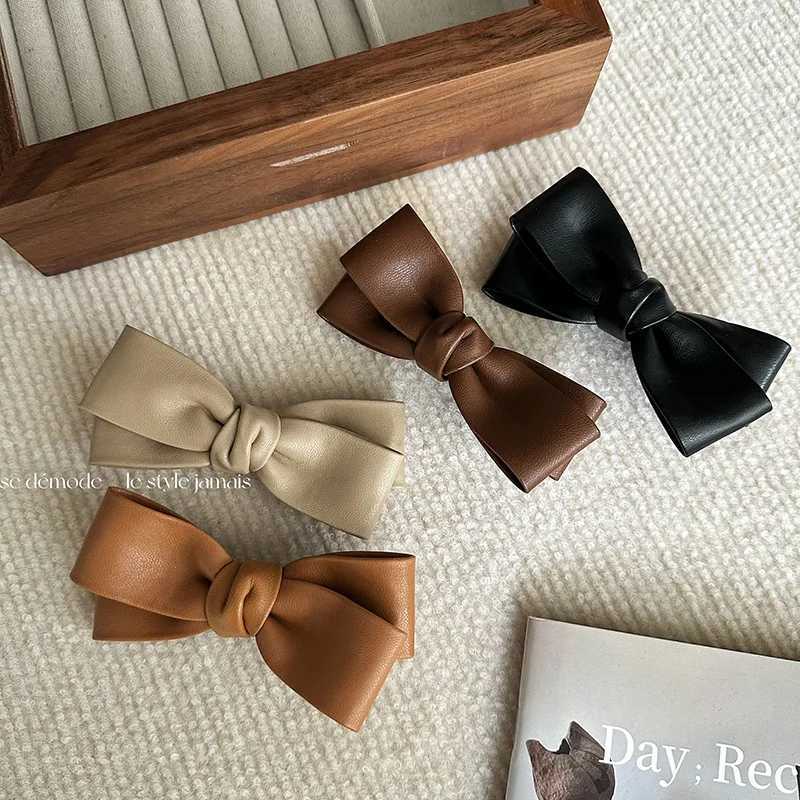 Ruoshui Woman Vintage PU Leather Bowknot Hairpins Ladies Fashion Hair Clips Hair Accessories Ornaments Barrettes Side clipW251028