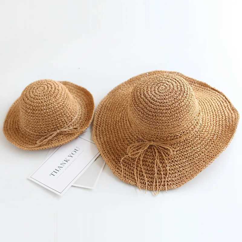 2024 New Girls Hand Made Sun Hat Kids Summer Raffia Straw Hat Big Brim Beach Cap Foldable Breathable Summer Parentchild Hat251028