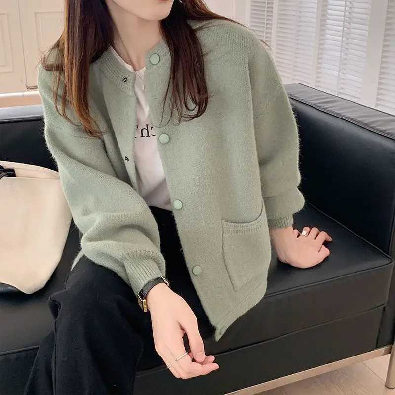 Fresh and Sweet Women Spring and Autumn New Spliced ONeck Button Pocket Fashion Solid Loose Casual Longsleeved Knitted TopT251028