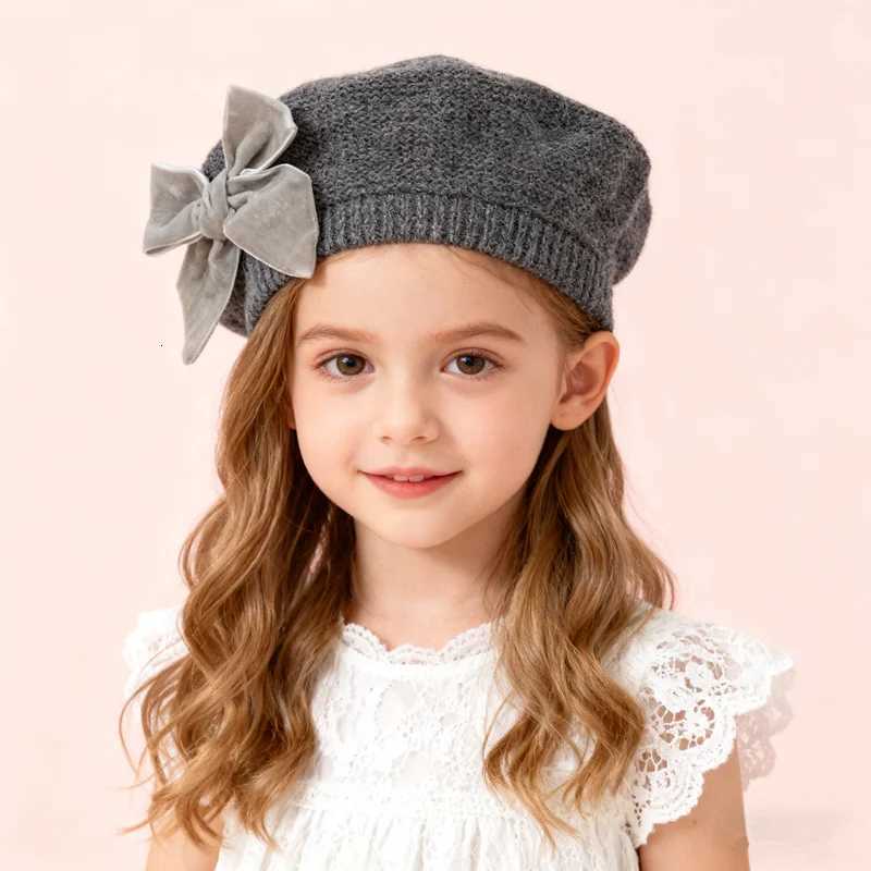 New Winter Baby Girls Warm Bowknot Knitted Hats Children Beret Beanie Hat Solid Hat Soft Comfortable Kids Bonnet For 312Years251028