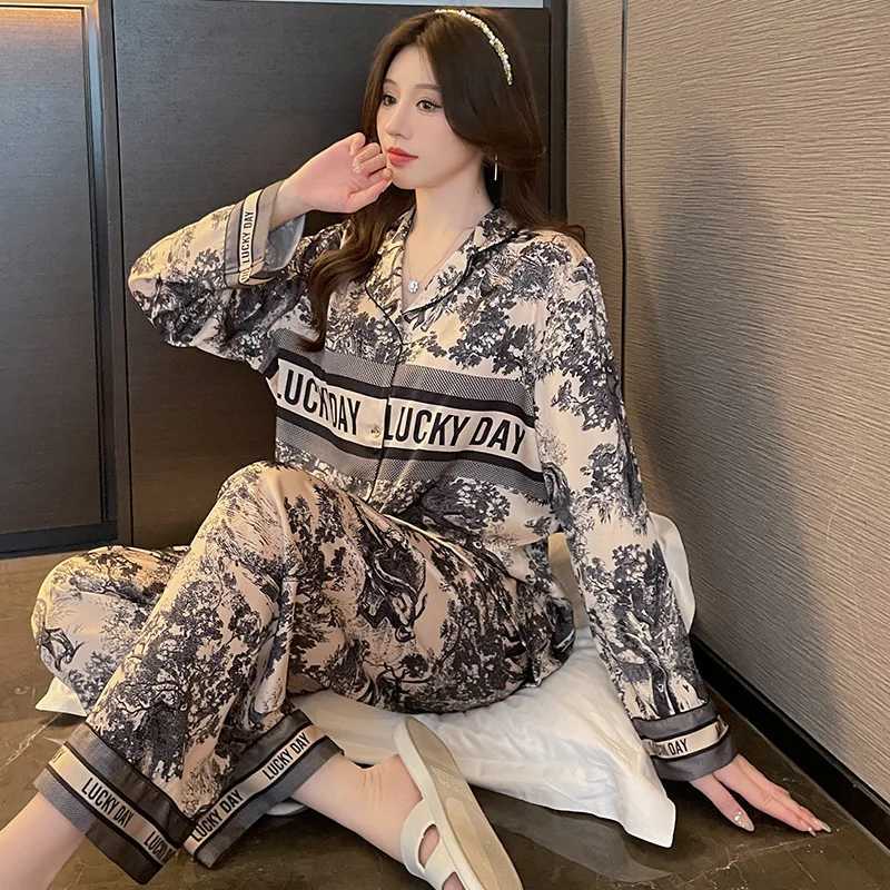 Ice silk pajamas womens inkwash painting longsleeved shirts and long pants highend elegant and comfortable home wearT251029