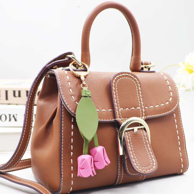 The same style as Xiaohongshu's tulip keychain - a cute and unique car key bag hanger accessory ddmytues
