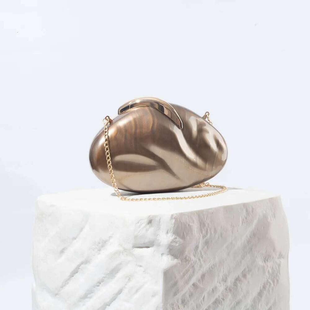 Designer Bags 2025 New Oval Acrylic Leaf Lock Dinner Fashion Wind Chain Shoulder Clutch Bag Luxury Bag