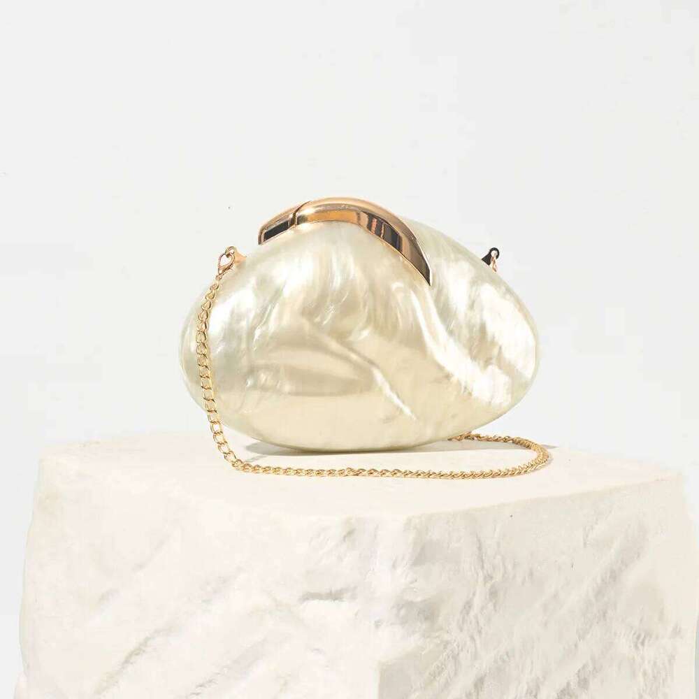 Designer Bags 2025 New Oval Acrylic Leaf Lock Dinner Fashion Wind Chain Shoulder Clutch Bag Luxury Bag