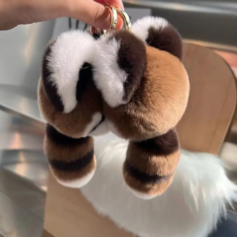 Real otter rabbit fur swing tail little raccoon fur bag pendant car interior pendant car key chain mobile phone pendant 251029