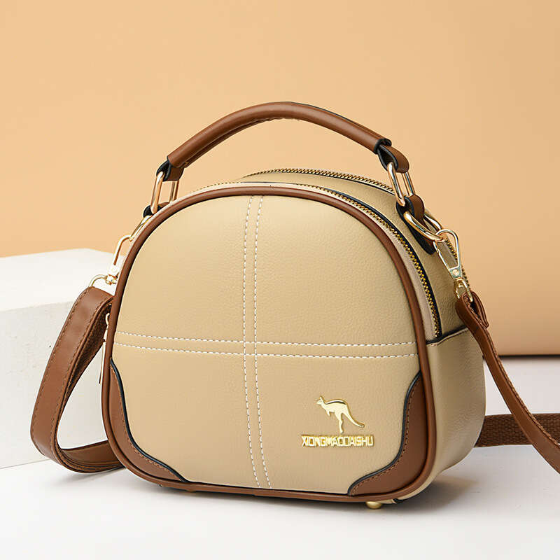 2025 New High-End Embroidered Crossbody Shoulder Women's Versatile Commuter Soft Leather Handbag Small Round Bag handbag for womens fashion bag